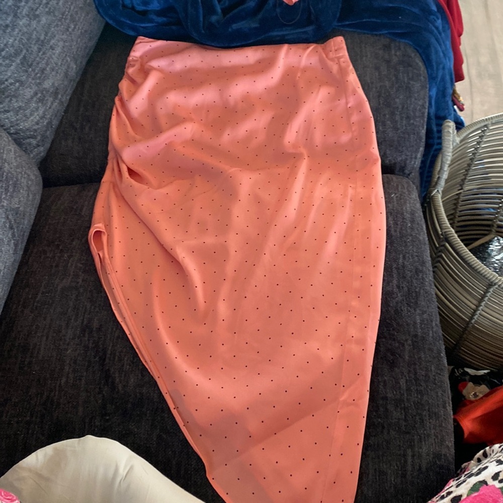 NWT super gorgeous skirt with slant bottom and detail on side of skirt